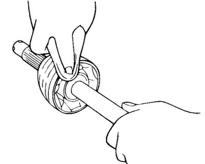 Fig. 3.125. Cleaning the outer CV joint