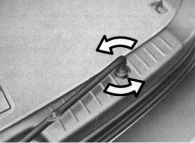 Fig. 1.193. Unscrewing the spare wheel…