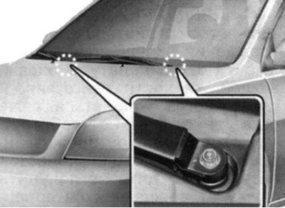 Fig. 1.213. Fastening the front wiper…