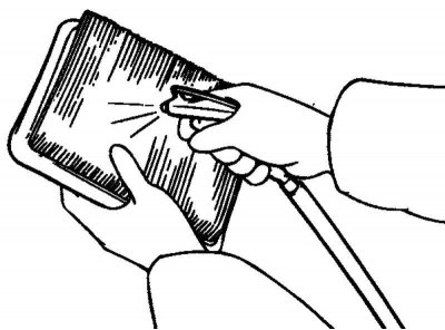 Fig. 2.192. Blowing out the air filter
