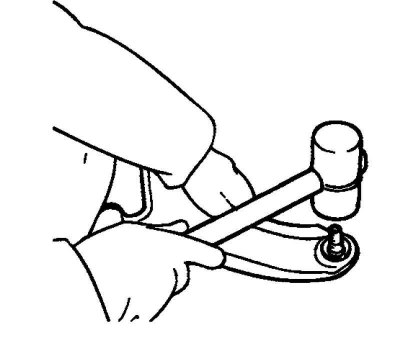 Рис. 4.30. Снятие шаровой опоры из нижнего рычага подвески в сборе