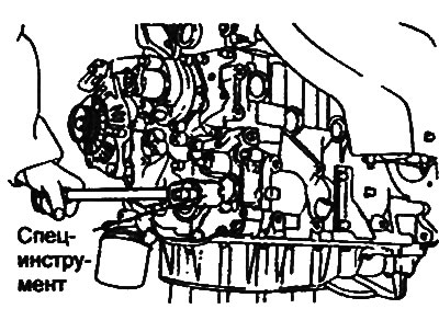 8. Using a special key, unscrew the oil…