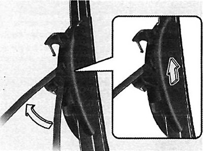 3. Squeeze the latch behind the arm and…