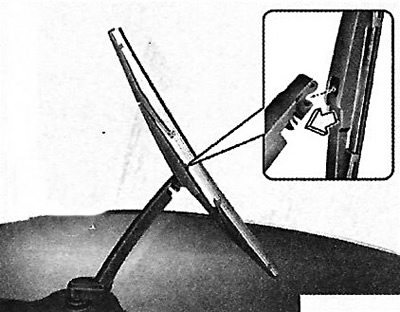 1. Lift the wiper arm and remove the…