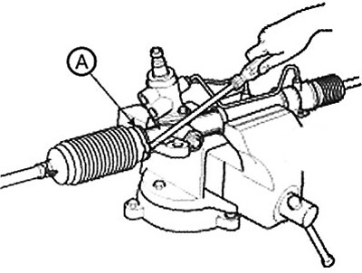 3. Remove the boot clamp (A).